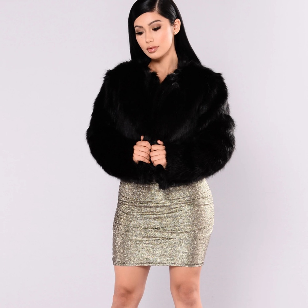 Black fur jacket. Never worn